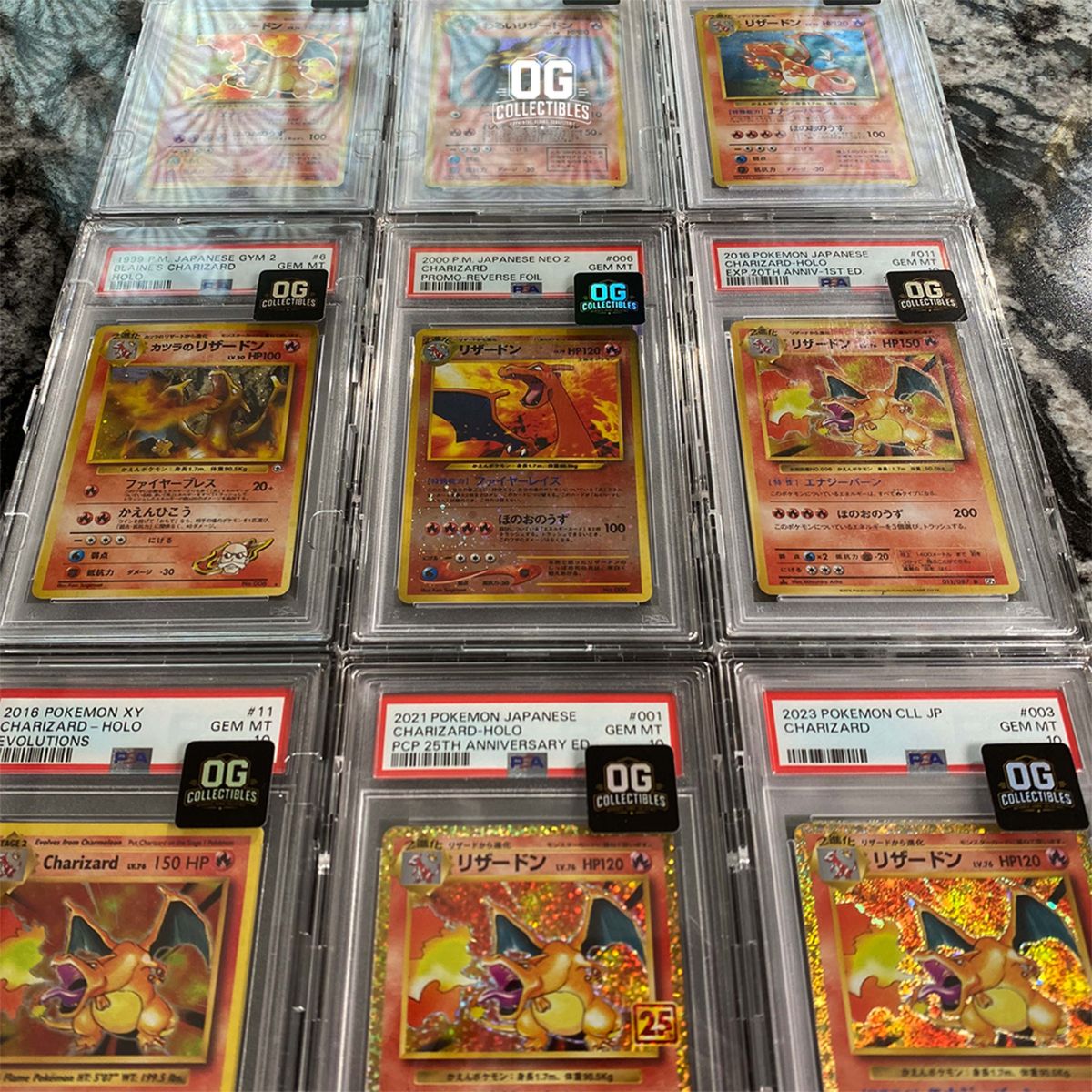 Pokémon Charizard PSA Slab Collection (1996–2023) – 9 Card Set